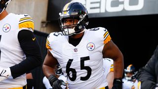 Pittsburgh Steelers offensive tackle Dan Moore Jr. (65) shuffles