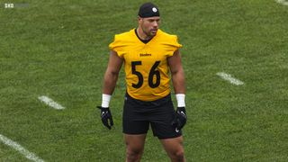 Baltimore, United States. 01st Jan, 2023. Baltimore Ravens tight end Isaiah  Likely (80) is brought down by Pittsburgh Steelers linebacker Robert  Spillane (41) during the first half at M&T Bank Stadium in