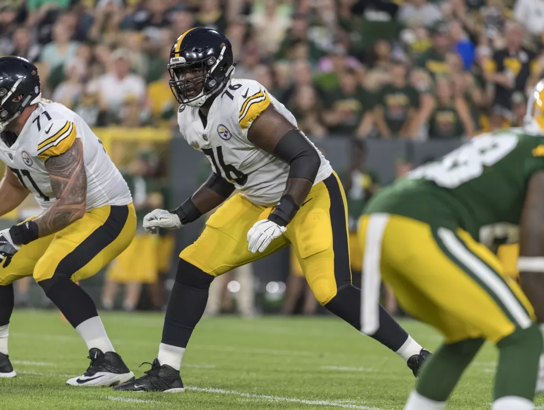 Dan Moore Jr. #65 of the Pittsburgh Steelers looks on against the News  Photo - Getty Images