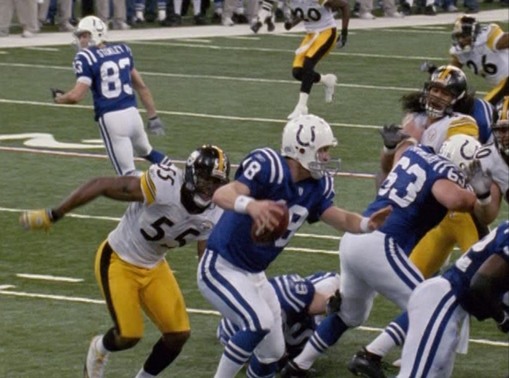 Linebacker Joey Porter of the Miami Dolphins celebrates after sacking