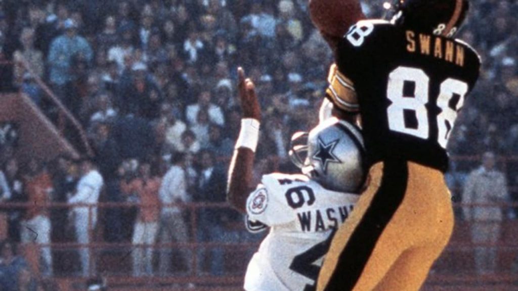 Steelers reserve quarterback Terry Bradshaw, sporting an early beard, warms  up his throwing arm on the sideline prior to entering 17-0 loss to the  Oakland Raiders in Pittsburgh, Sept. 29, 1974. Bradshaw