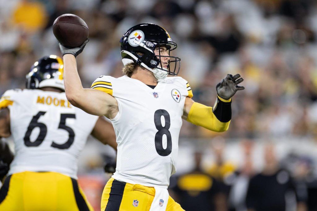 Pittsburgh Steelers quarterback Kenny Pickett rolls out against the Tampa  Bay Buccaneers during an NFL football game at Acrisure Stadium, Sunday,  Oct. 16, 2022 in Pittsburgh. (Winslow Townson/AP Images for Panini Stock