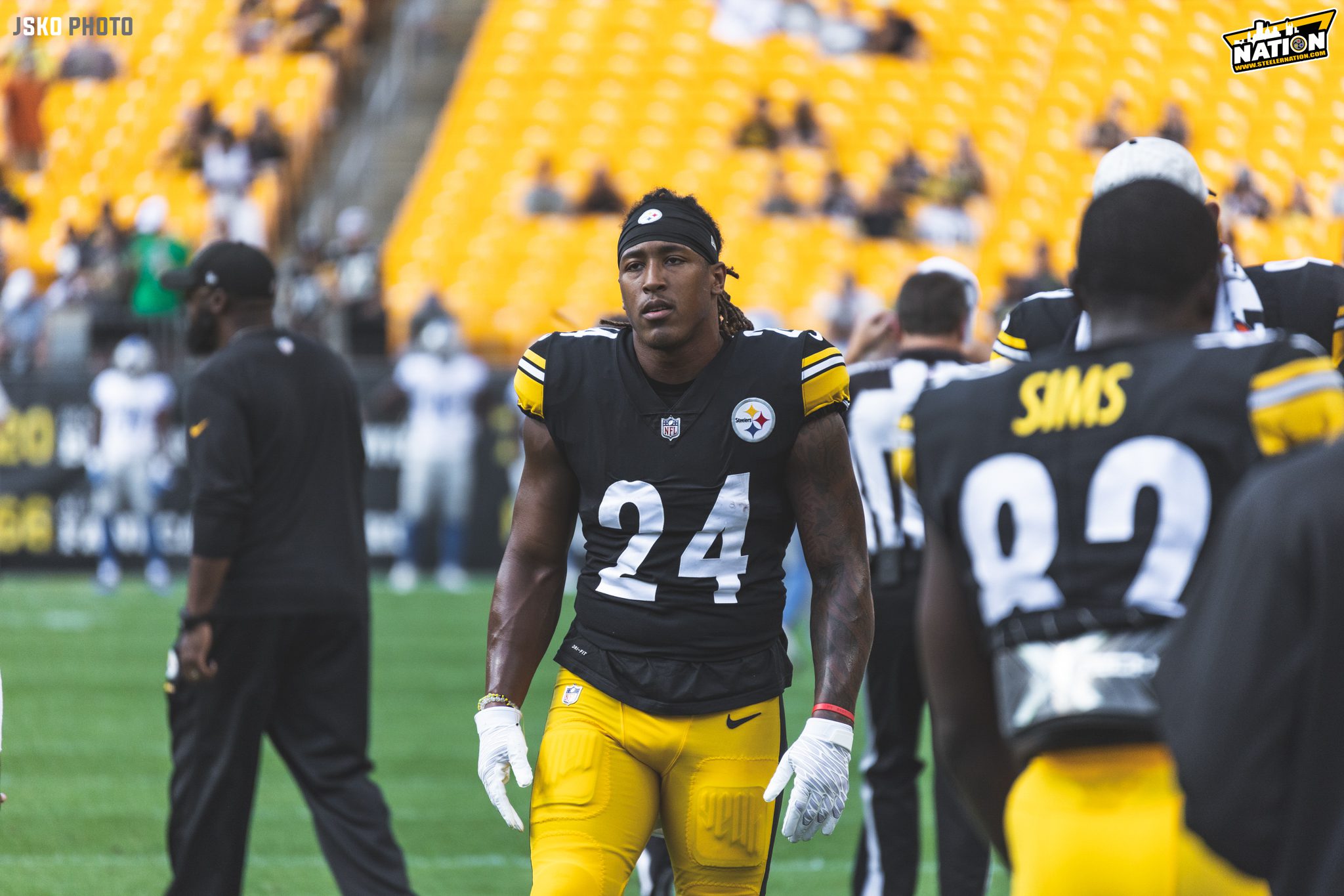 Pittsburgh Steelers running back Benny Snell (24) is greeted by a group of  young football players as he takes the field for the team's first day of  drills during their NFL football