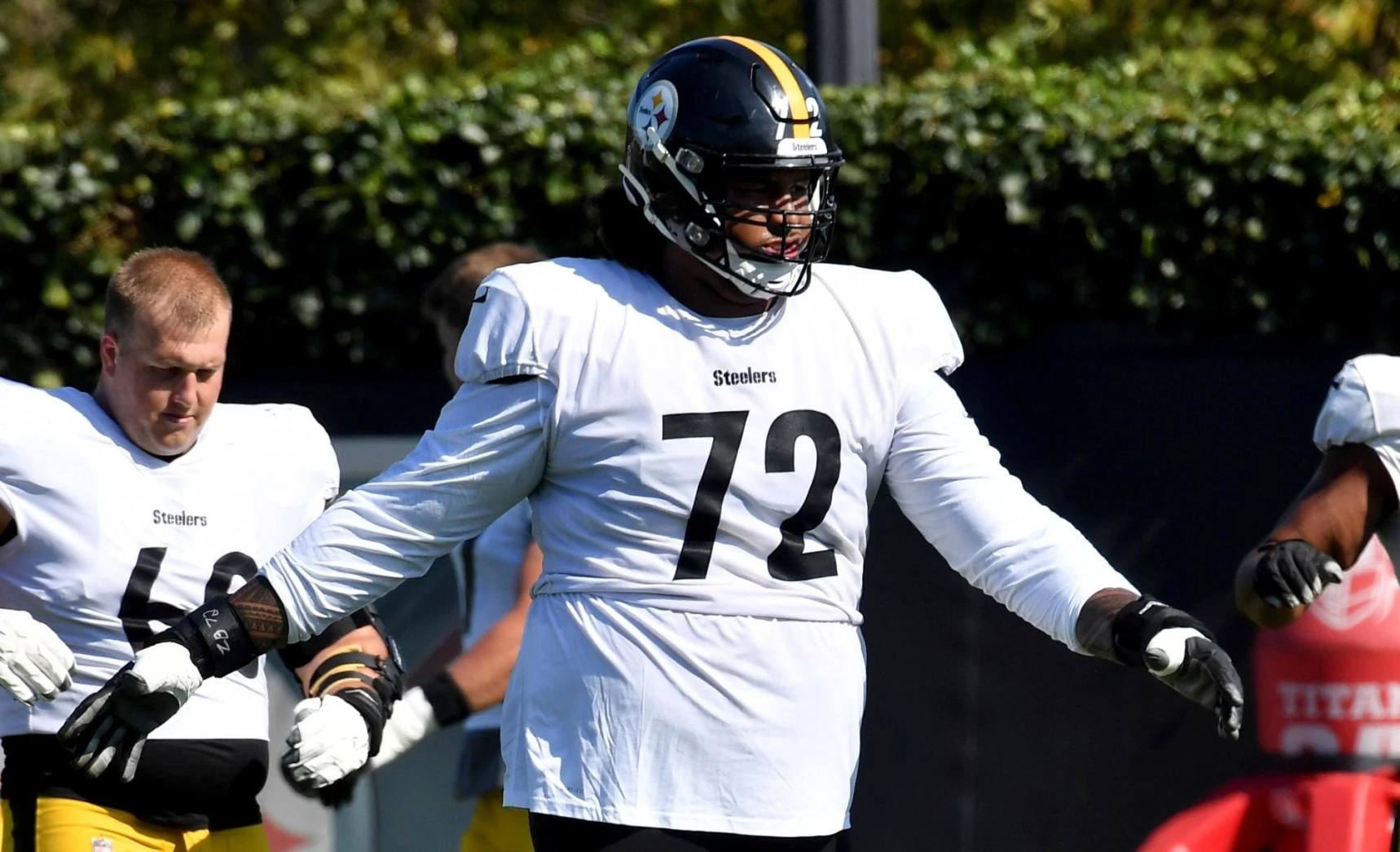 A Pittsburgh Steelers fans holds up a jersey of former quarterback