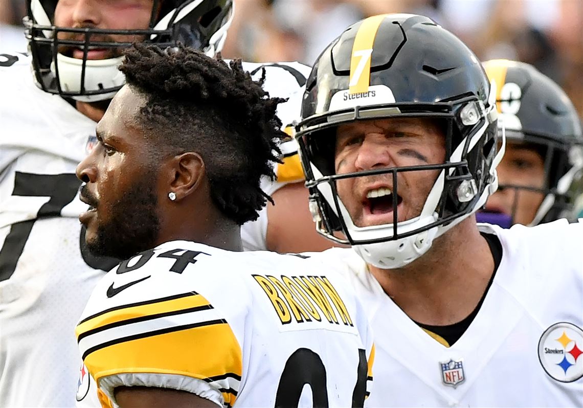 Cincinnati Bengals Michael Johnson holds on the jersey and sacks Pittsburgh  Steelers quarterback Ben Roethlisberger for a lost of eight yards in the  second quarter at Heinz Field in Pittsburgh, Pennsylvania on