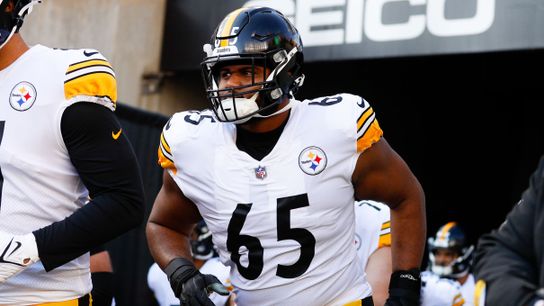 Steelers' Dan Moore Jr. comes out of the tunnel for the start of the game