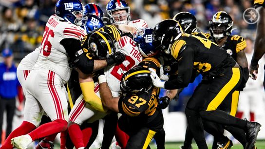 Steelers' defensive line takes down New York Giants' running back Tyrone Tracy Jr. during a Week 8 regular season game. Steelers' defensive line takes down New York Giants' running back Tyrone Tracy Jr. during a Week 8 regular season game.