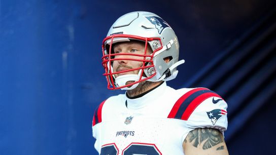Cole Strange walks out of the tunnel during a game for the New England Patriots