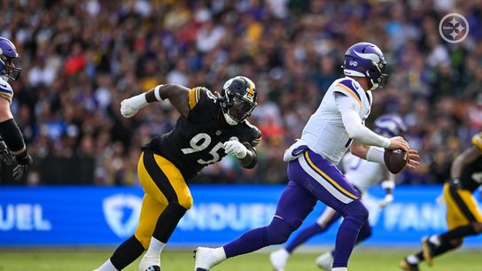 Steelers' defensive lineman Keeanu Benton chases down Minnesota Vikings quarterback, Carson Wentz. Steelers' defensive lineman Keeanu Benton chases down Minnesota Vikings quarterback, Carson Wentz.