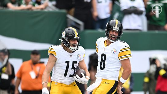 Ben Skowronek and Aaron Rodgers celebrate following a touchdown pass against the New York Jets.