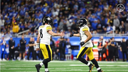 Steelers quarterback Aaron Rodgers (8) and tight end/fullback Connor Heyward (83) during a regular season matchup between the Pittsburgh Steelers and Detroit Lions.