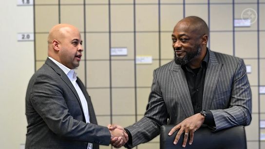 Steelers General Manager Omar Khan and Head Coach Mike Tomlin at the UPMC Rooney Sports Complex during the NFL Draft.