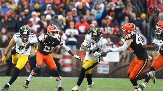 Steelers tight end Pat Freiermuth (88) and Steelers running back Kenneth Gainwell (14) during a regular season matchup between the Pittsburgh Steelers and Cleveland Browns. Steelers tight end Pat Freiermuth (88) and Steelers running back Kenneth Gainwell (14) during a regular season matchup between the Pittsburgh Steelers and Cleveland Browns.