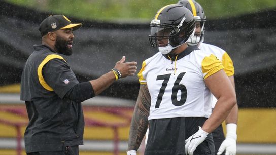 Pittsburgh Steelers Offensive Tackle Troy Fautanu Listening to Assistant Offensive Line Coach Isaac Williams During Steelers OTS's As They Prepare For The 2025 Season