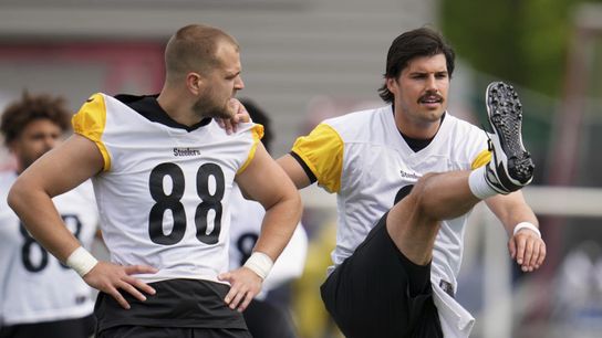 Steelers Mason Rudolph and Pat Freiermuth warm up before an OTA practice during the week of June 2, 2025.