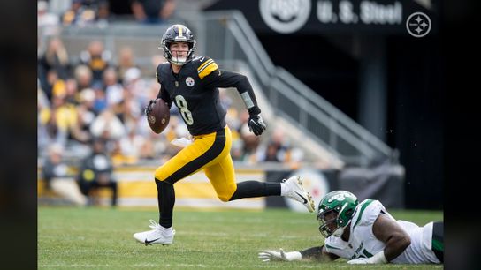 Pittsburgh Steelers QB Kenny Pickett (8) scrambles out of the pocket in a Week 3 loss vs The New York Jets. / Karl Roser. Steelers.com/ 
