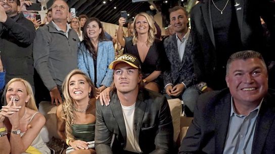 Steelers draft QB Kenny Pickett as he watches with family