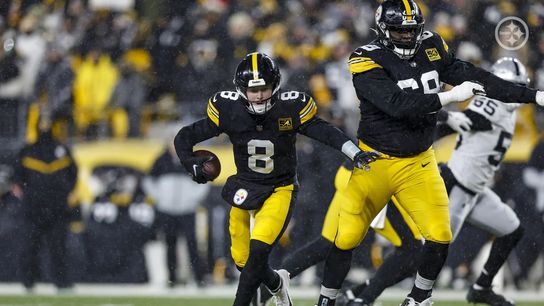 Steelers QB Kenny Pickett (#8) rolls out of the pocket against the Las Vegas Raiders in Pittsburgh, PA. 