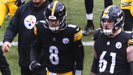 Steelers quarterback Kenny Pickett (#8) and center Mason Cole (#61) look in sync during their 2023 preseason