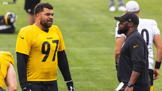 Steelers Cam Heyward and Mike Tomlin