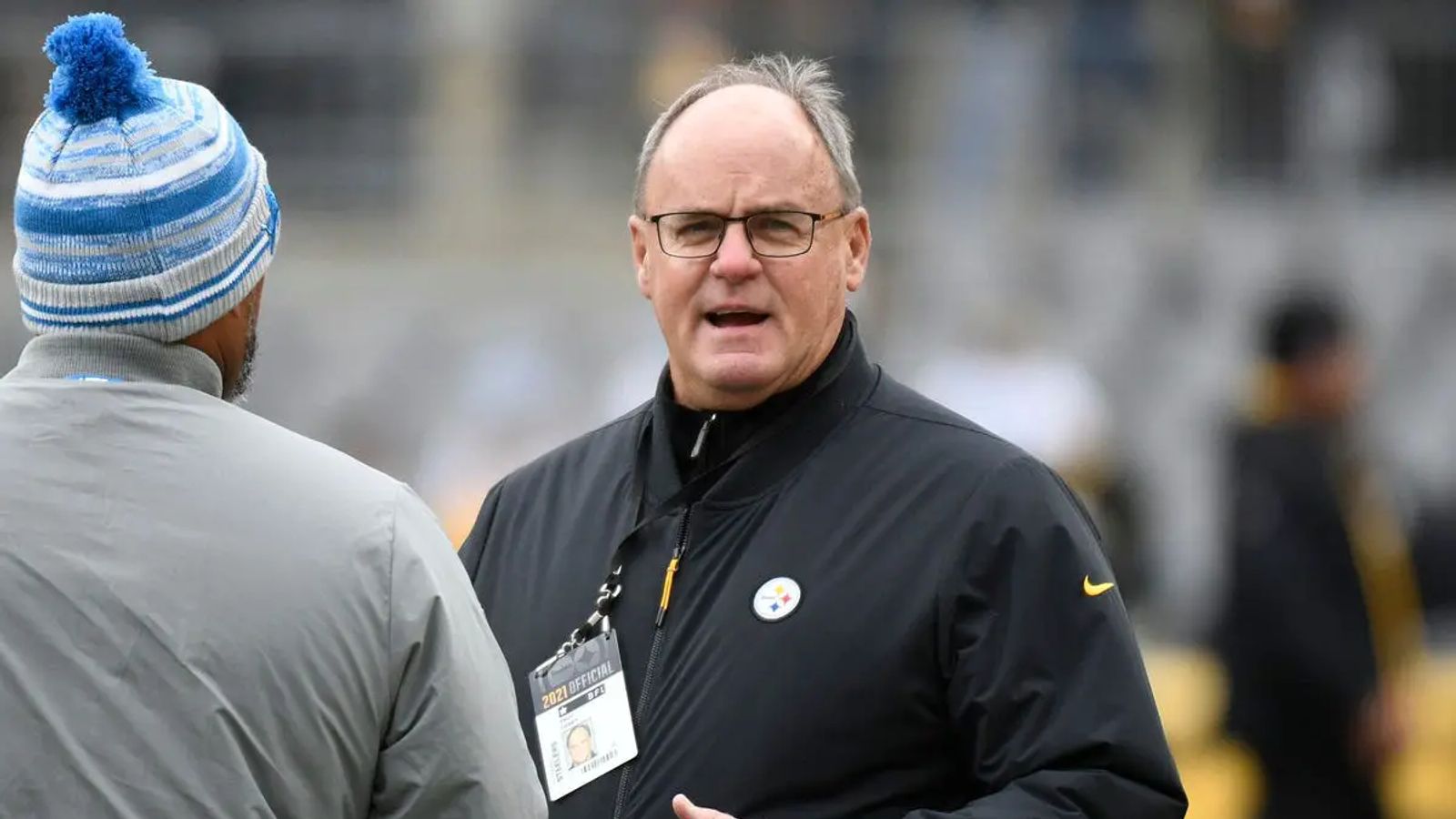 Quarterback Kenny Pickett, the Pittsburgh Steelers first-round draft pick,  left, poses for a photo with president/owner Art Rooney II, at the team's  training facility in Pittsburgh, Friday, April 29, 2022. (AP Photo/Gene