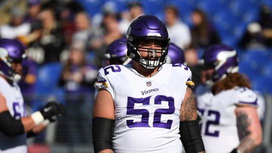 Minnesota Vikings center Mason Cole (52) looks on during pre-game warm-ups before an NFL football game against the Baltimore Ravens, Sunday, Nov. 7, 2021, in Baltimore. 