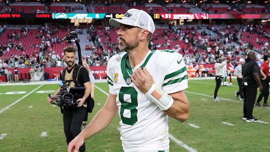 New York Jets' Aaron Rodgers walking off the field in 2024.