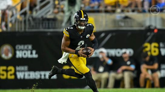 Steelers' Justin Fields during a pass play in a preseason game.