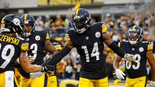 Pittsburgh Steelers Wide Receiver George Pickens (14) High Fives teammate Gunner Olszewski