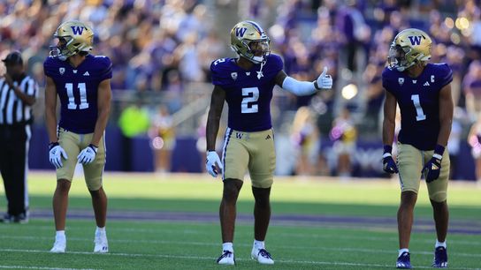 Washington wide receivers Rome Odunze, Ja'Lynn Polk and Jalen McMillan get ready for a play. Steelers' Jalen McMillan