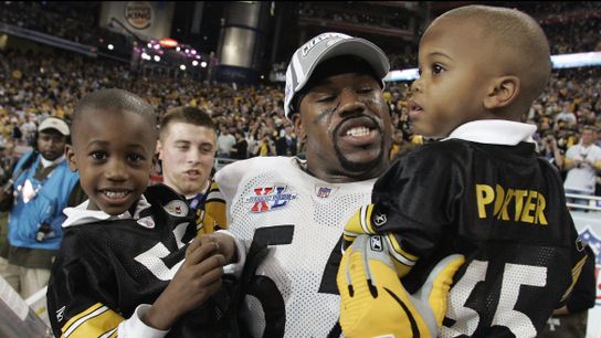 Steelers OLB Joey Porter poses with his children after the Steelers won Super Bowl XL.