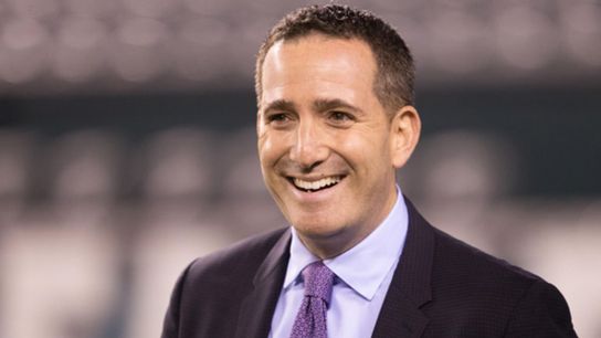 Eagles GM Howie Roseman smiles on the sideline before a game. Steelers' Howie Roseman