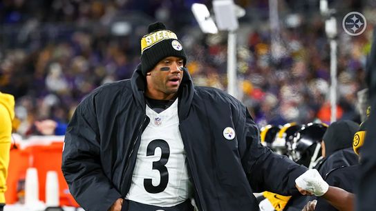 Pittsburgh Steelers Quarterback Russell Wilson talks to his team on the bench during a game against the Baltimore Ravens at the end of the 2024 regular season.