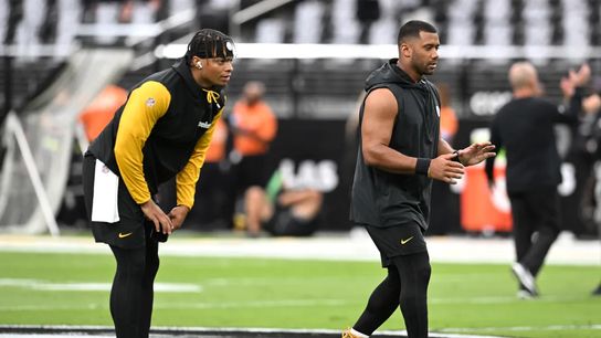 Steelers' Russell Wilson and Justin Fields warm up before a game