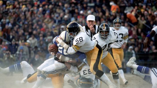 Old school Steelers football making a tough play Old school Steelers football making a tough play