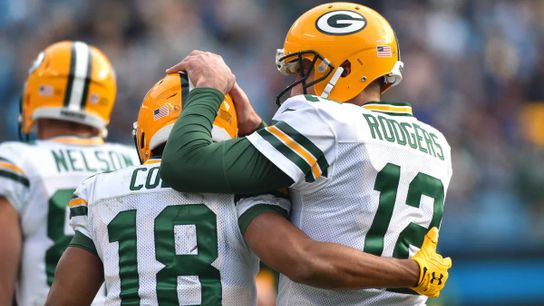 Steelers' Aaron Rodgers with former Green Bay Packer teammate Randall Cobbs hugging on the sideline. Steelers' Aaron Rodgers with former Green Bay Packer teammate Randall Cobbs hugging on the sideline.