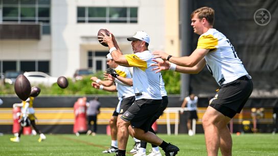Steelers' quarterback Aaron Rodgers (left) and Will Howard (right) participating in drills during 2025 mini camp